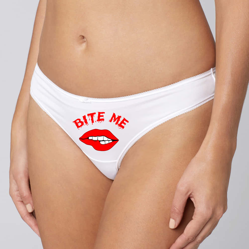 Bite Me Knickers. Thong style panties in white cotton with Bite Me on front.